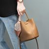 New first-layer cowhide bag, high-end niche design women's bag, spring and summer leather single shoulder crossbody bucket bag