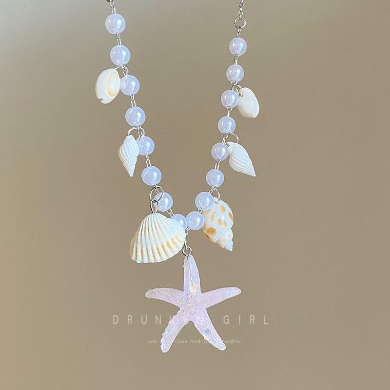 Summer starfish shell necklace niche design sense dopamine imitation pearl white collarbone chain seaside vacation photo