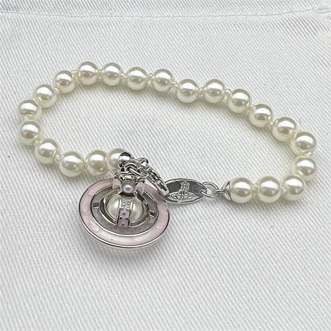 

Высококачественный кулон Сатурн Vivienne Westwood, жемчужная эмалевая подвеска, ожерелье и серьги - Минималистичный, нишевый, высококлассный набор аксессуаров