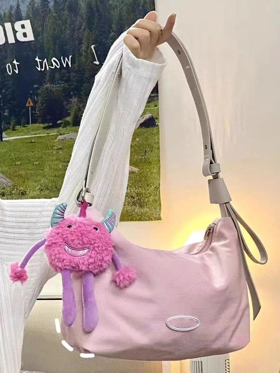 

Ji Japanese casual messenger bag women s niche commuter women s bag shoulder bag underarm bag large capacity student tote bag рожевий