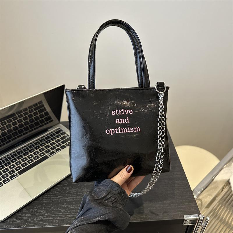 

2024 весна новая модная простая сумка женская сумка-ведро для отдыха пригородная сумка ретро тренд большая вместительная сумка через плечо чёрный