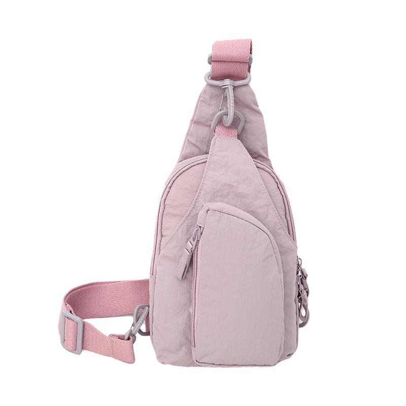 

2025 summer new women s shoulder bag small messenger bag with adjustable shoulder straps simple and lightweight casual backpack фіолетовий