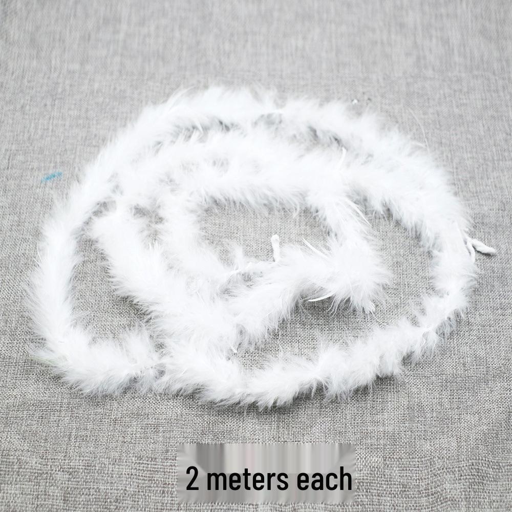Weiße Feder Kollektion: DIY Handgemachte Bekleidungsaccessoires mit Gänse- und Truthahnfedern