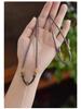 Collana Laccetto Intrecciato Fatto a Mano con Ciondolo Dorato: Stile Unisex di Alta Gamma