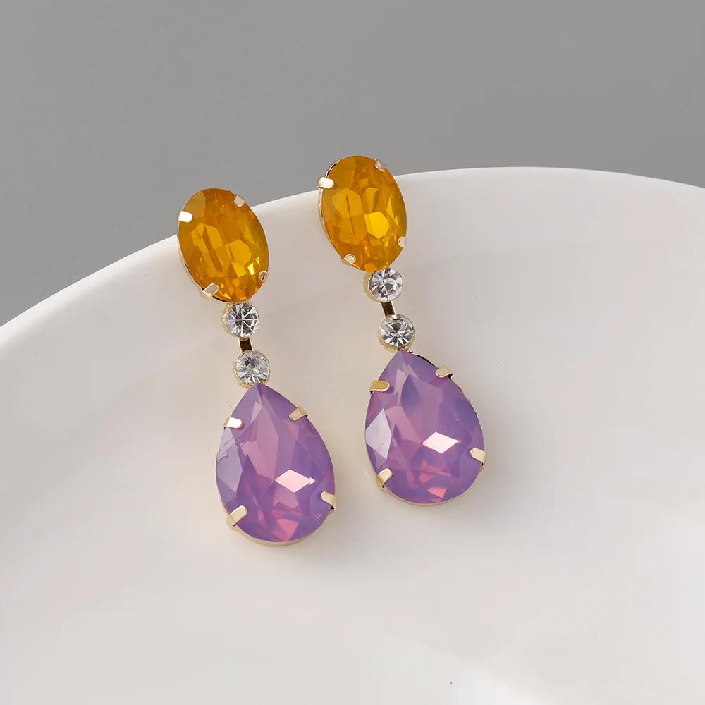 

Европейские американские простые геометрические овальные серьги-гвоздики в форме капли для женщин Four Seasons Fashion Commuter Alloy Diamond Earrings фиолетовый