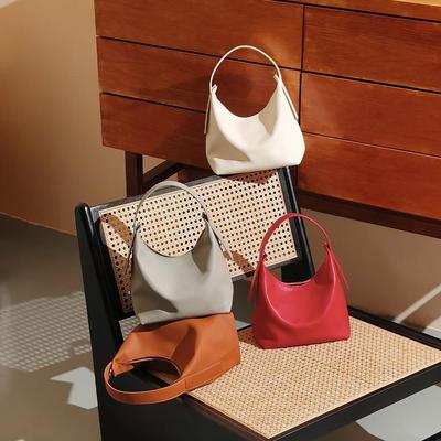 Borsa Sottobraccio a Forma di Raviolo in Pelle di Mucca di Alta Gamma - Design di Nicchia per il Pendolarismo Quotidiano e da Portare a Spalla