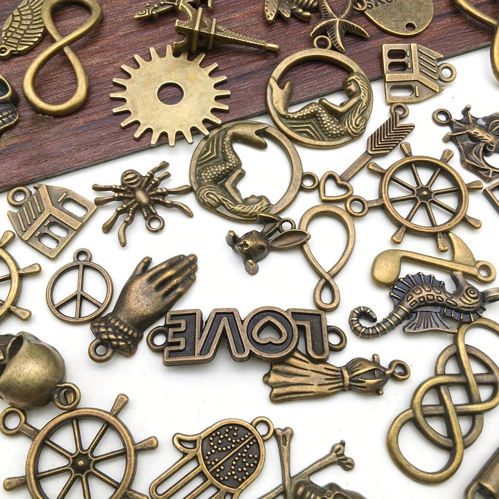 Misto Vintage 100pz Casuale Lega Bronzo Antico Ciondolo Charms Fatto a Mano DIY Bracciale Pendenti