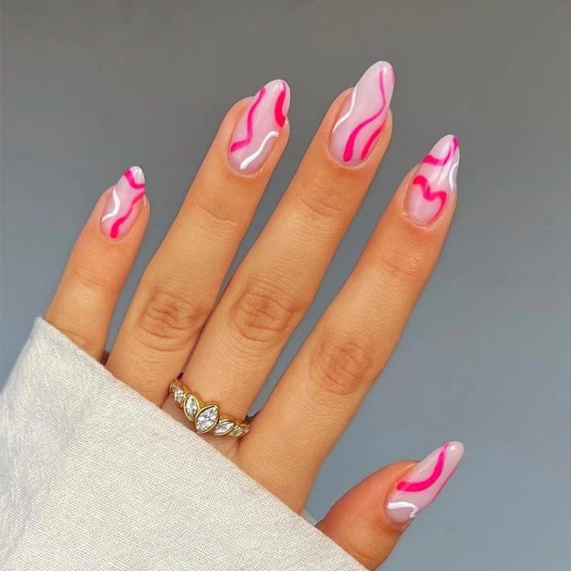 

Wearing nail pads Simple red pink and white contrasting colors Wave nail pads Removable nail nails