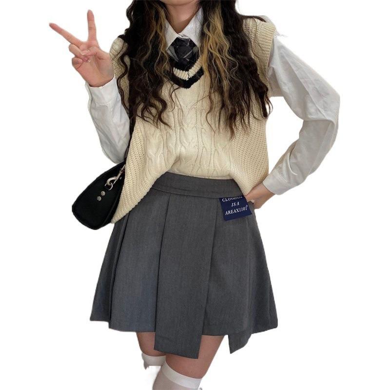 Niche Design College Style High-Waist Irregular Mini Skirt for Spring/Summer