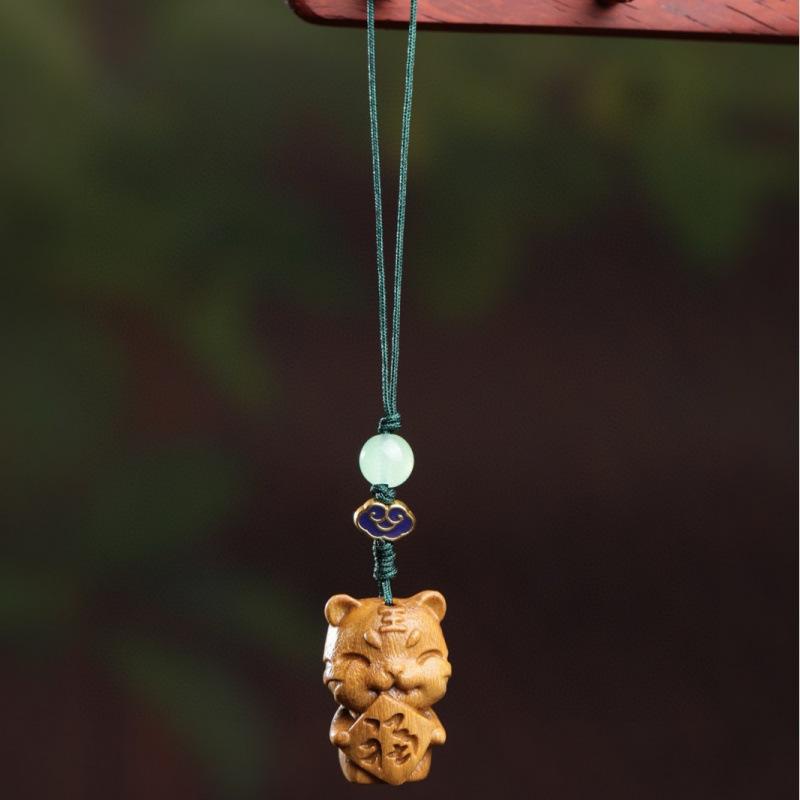 Twelve Zodiac Animal Charms Green Sandalwood Set: Rat, Ox, Tiger, Rabbit, Dragon, Snake, Horse, Sheep, Monkey, Rooster, Dog, Pig.