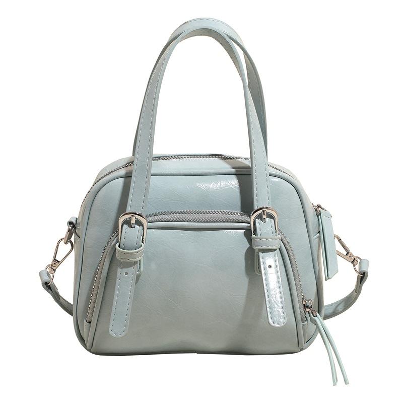 

Весна и лето новая корейская нишевая ins ветер масляная вощеная кожа портативная сумка-подушка повседневная универсальная для поездок на работу ветер мессенджер женская сумка