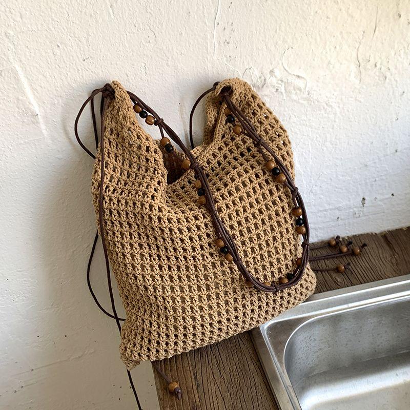 

Summer Hollow Woven Bag Women 2025 New Seaside Vacation Beach Straw Bag Large Capacity Shoulder Messenger Bag Khaki