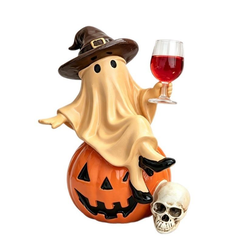 Halloween Ghost Sitting On A Pumpkin Figurine, Witch Holding A Red Wine Glass, Skeleton Decorating The Home Table for A Party Setup.