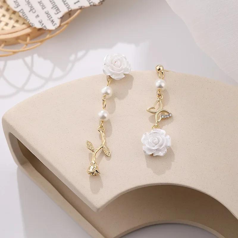 

Women Fashion Gifts Korean White Rose Earrings Asymmetric Butterfly Earrings New Trendy Earrings Ear Jewelry Accessories 1