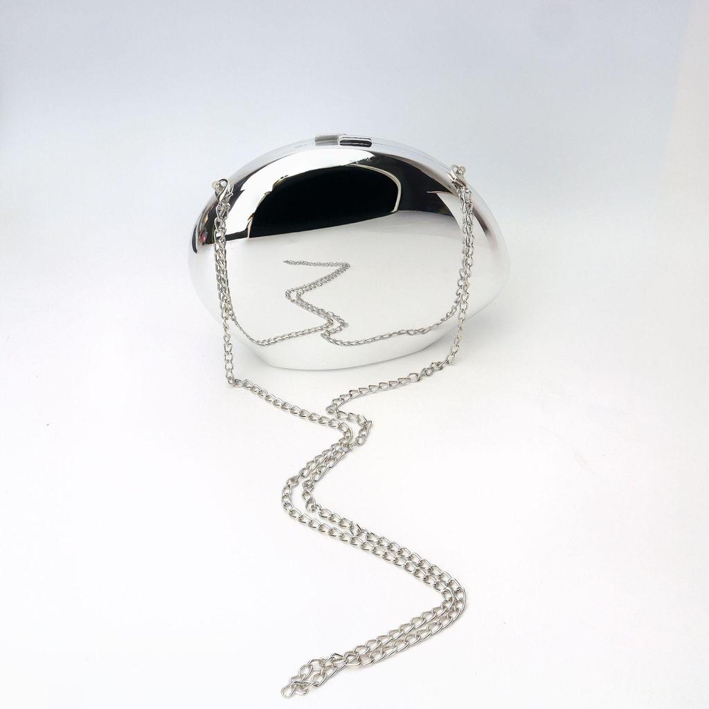 2025 Glänzendes Gold Metallic Gänseei Acryl Clutch