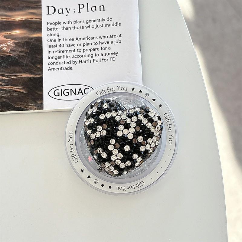 

Korean Ins Style High-end Magnetic Suction Mobile Phone Airbag Holder Wholesale Cross-border Pasting Telescopic Desktop Watch Ring