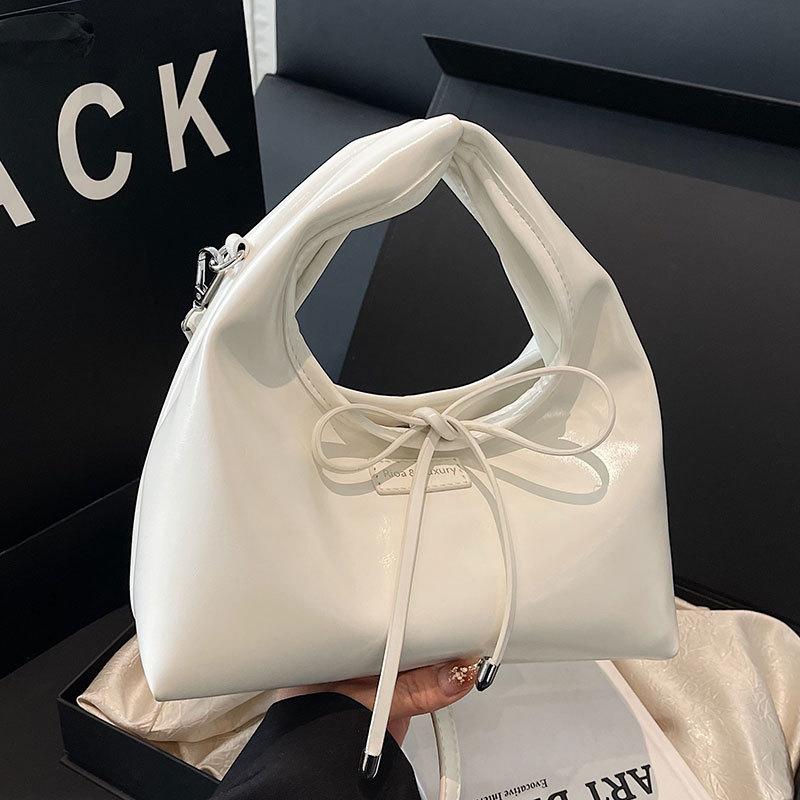 Early Spring New Gentle Wind Solid Color Soft Leather Handbag Bag Women's Simple Straps Bow Versatile Commuter Messenger Bag