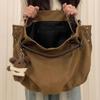 Tote Bag with Large Capacity and Multiple Pockets, for Commuting, with A Single Shoulder Strap and A Slanted Design.