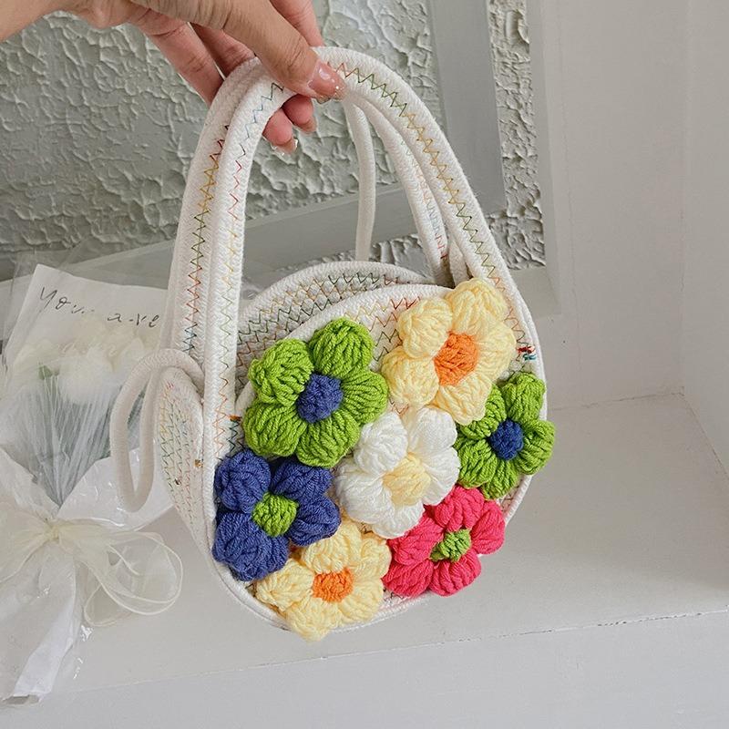 Herbst- und Winterblumentasche Damen Frühling und Sommer Nischendesign Strohhandtasche ausländische frische Umhängetasche vielseitig