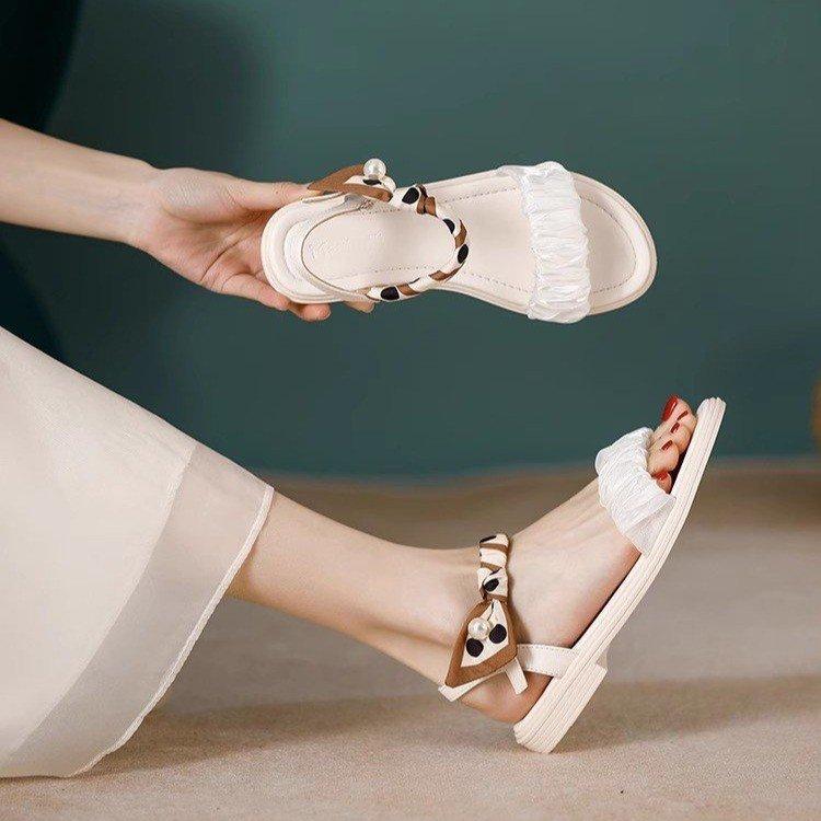 Flat-soled sandals women's new versatile fashion with skirt one-word belt, low-heeled work cool slippers