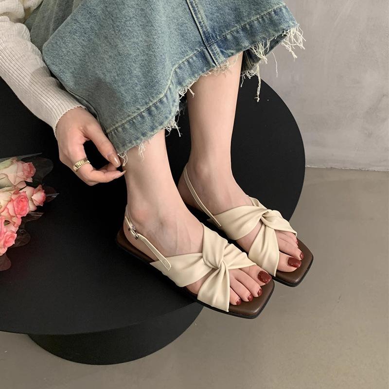 Flat-soled sandals women's summer wear new versatile French beautiful fairy style with skirt travel seaside Roman shoes