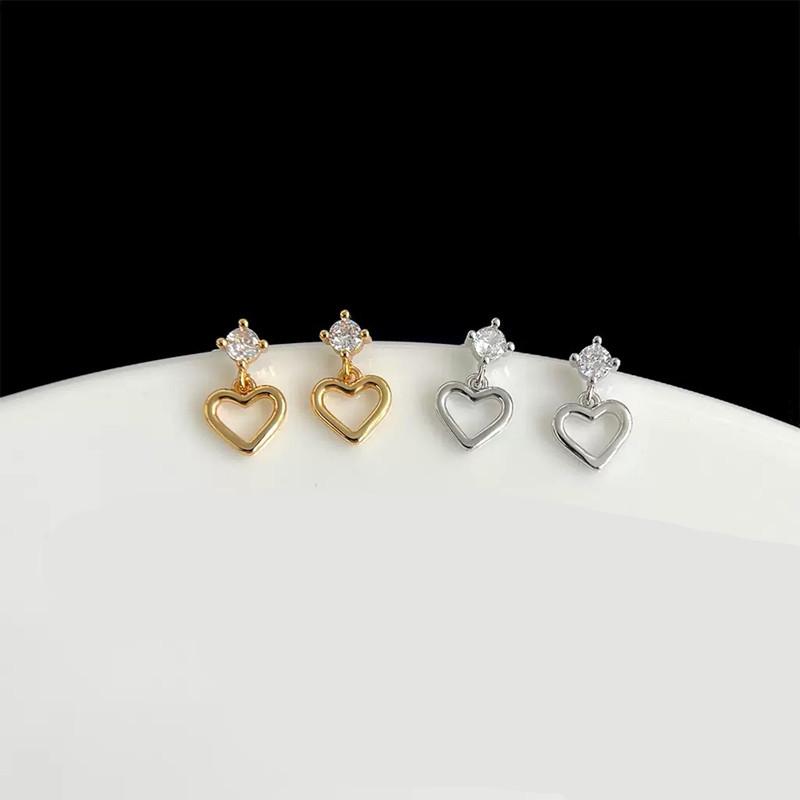Beixi S925 Sterling Silver Zirconia Heart Stud Earrings - Simple, Fashionable, and Versatile.