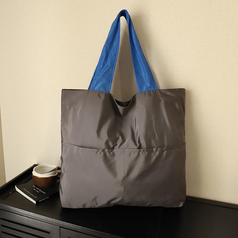 Japanese-Style Foldable Cloud Bag: Portable, Large-Capacity, Waterproof Shoulder & Handheld Grocery Bag with Zipper.