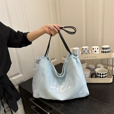 Lente en zomer nieuwe eenvoudige forens schoudertas modieuze tote bag veelzijdige textuur trendy messenger handtas