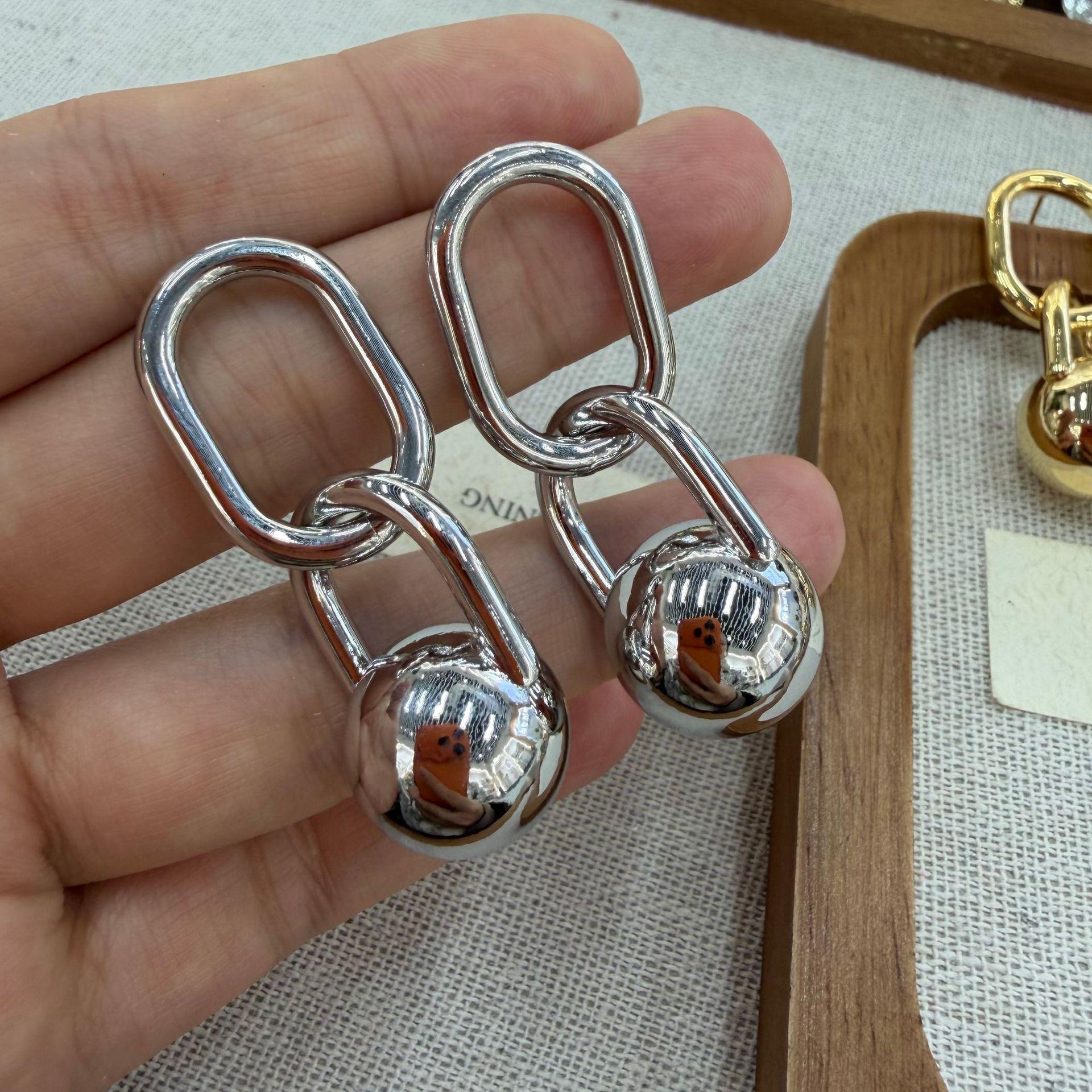 

Metal Wind Simple Ball Ring Buckle Hollow Earrings Fashionable Hollow Ball Geometric Stud Earrings