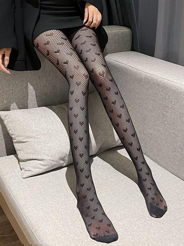A pair of women's fishnet love pantyhose fashion thin heart-shaped transparent tights
