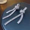 Zircon knotted long tassel silver needle earrings Korean niche elegant light luxury earrings 