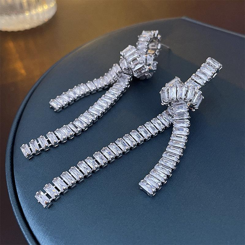 Zircon knotted long tassel silver needle earrings Korean niche elegant light luxury earrings 