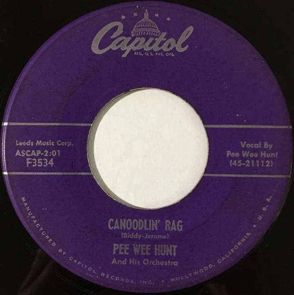 

7inch Record PEE WEE HUNT & HIS ORCHESTRA - Canoodlin Rag / I ll See You In Cu F3534 Capitol Records 1956 US Jazz Used