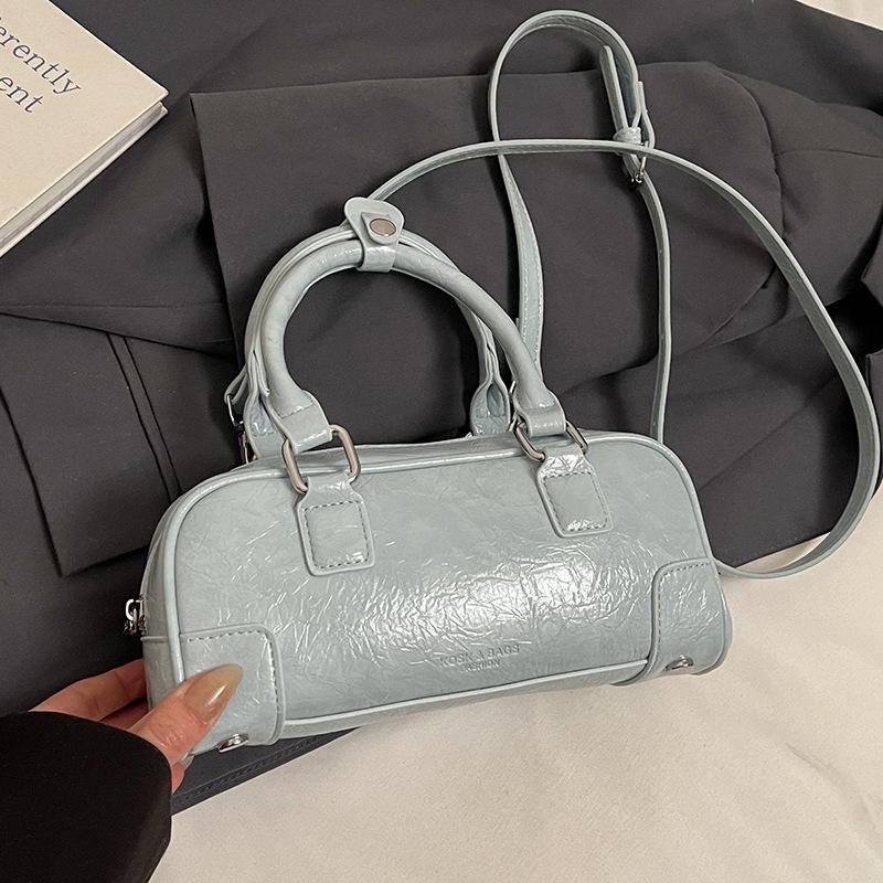 Korean niche simple portable bowling bag women 2025 new versatile foreign style fashion messenger pillow bag