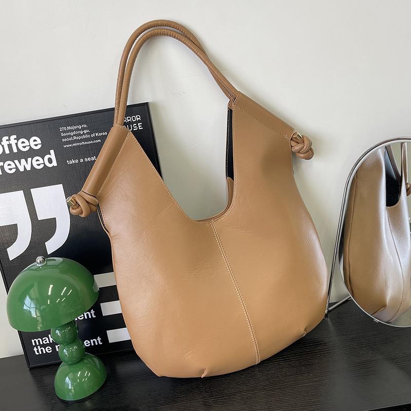 

Сумка-тоут премиум-класса в нишевом минималистичном стиле, женская, весенняя новинка, большой вместимости, для通勤, универсальная, на плечо, подмышку светло-коричневого