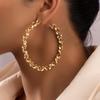 European Best-Selling Exaggerated Large Hoop Twisted Earrings with Creative Woven Metal Studs.