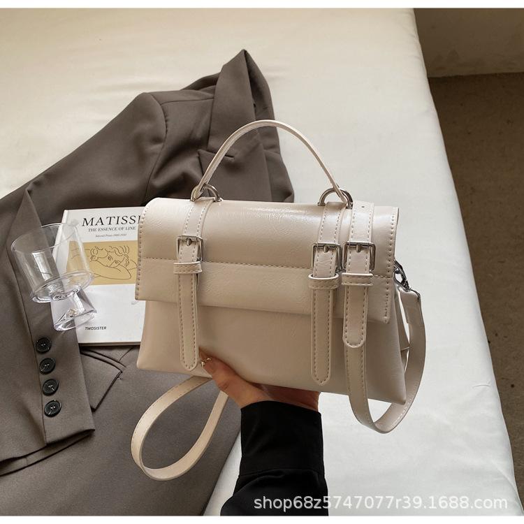 Retro preppy style large-capacity handbag women's 2025 pre-spring new Korean solid color shoulder bag textured messenger bag