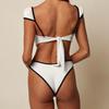 Women's Black & White Puff Sleeve Two-Piece Bikini - High Waist, Slimming Luxury Swimwear for Vacation or Hot Springs.