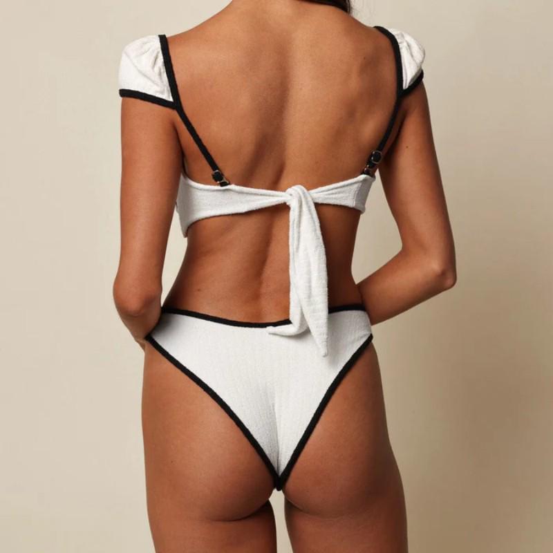 Women's Black & White Puff Sleeve Two-Piece Bikini - High Waist, Slimming Luxury Swimwear for Vacation or Hot Springs.
