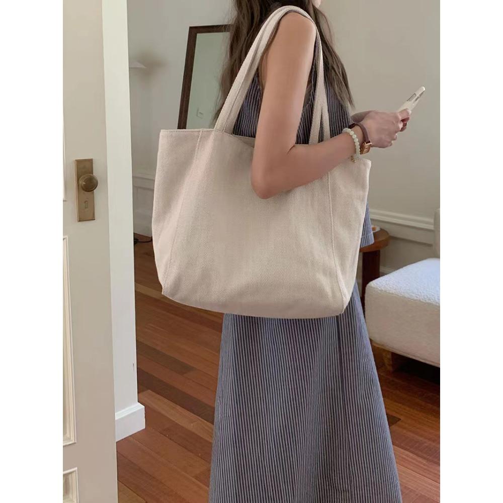 Сумка женская 2024 новая большая сумка-тоут корейская версия твиловая холщовая сумка для commuters плечевая портативная повседневная женская сумка