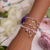 GEMCHIC Women's Colorful Beaded Stainless Steel Bracelet Set with Heart Bow Flower Charms Non-Tarnish Luxury Fashion Jewelry