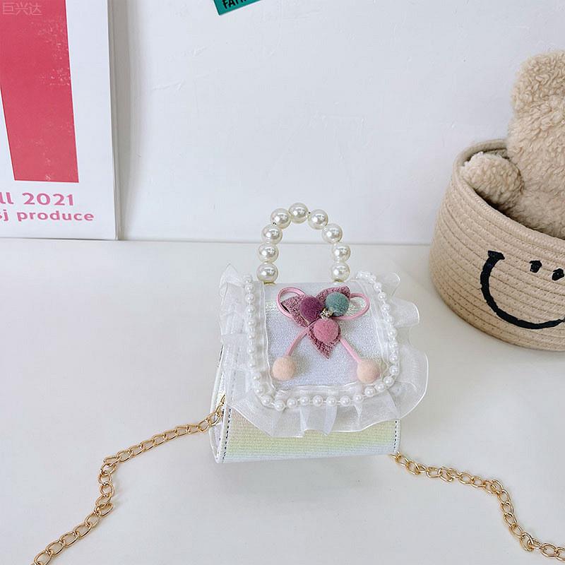 Trendy Mini Pu Crossbody Bag For Kids Featuring Stylish Bow And Pearl Design