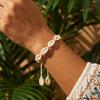 Bohemian Kauri-Muschel Surfer-Armband für Damen Handgefertigt Geflochtenes Seil Verstellbar Makramee Handkette Sommer Strand Schmuck