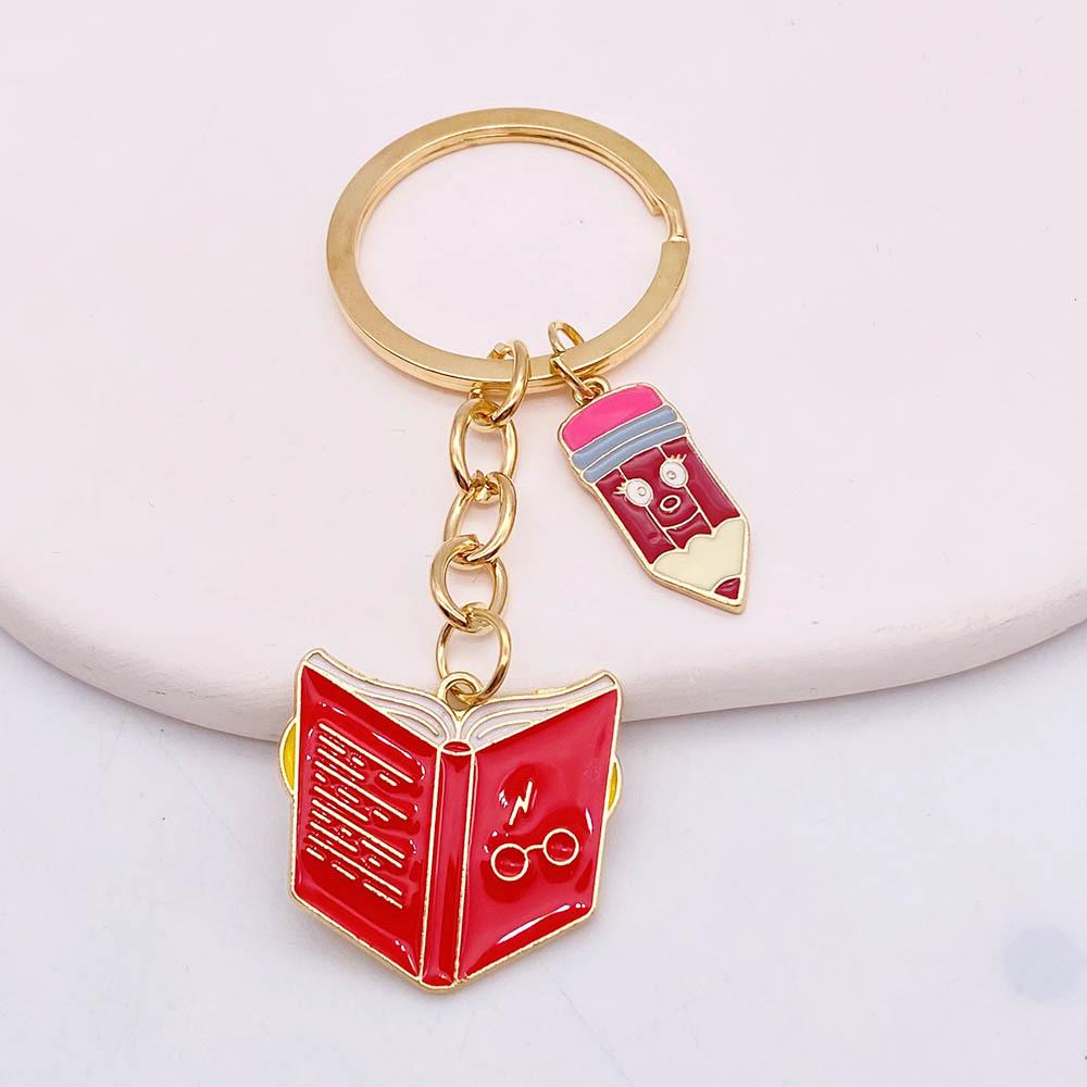 Graduation Souvenir Keychain with Gown, Cap, and Pencil Charms
