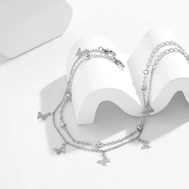 Fashion stacked women's beach copper bead foot decoration simple and exquisite hollow butterfly pendant anklet