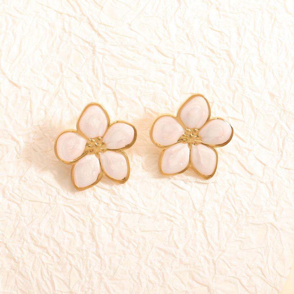 Japanese and Korean fresh sweet metallic three-dimensional irregular white drip flower earrings with stud earrings for women, gentle elegance