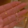 Small Flower Necklace Female Temperament Versatile Clavicle Chain Young High-end Half-diamond Five-petal Pendant