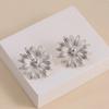 Retro style metal daisy earrings, gold three-dimensional petal stud earrings, fashionable personalized earrings.