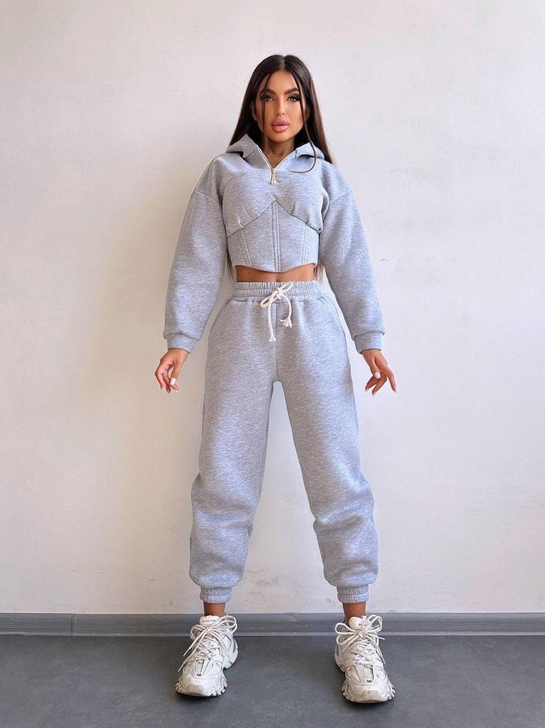 European and American fashion casual women's solid color long-sleeved waist cardigan hooded sweater strappy pants two-piece set