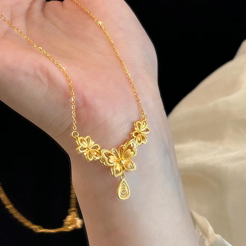 Shining butterfly tassel necklace new in gorgeous antique gold craftsm hollow flower water droplet collar chain wedding